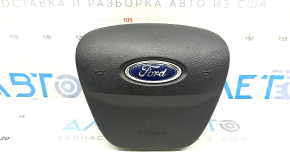 The Ford Escape MK4 20-25 driver's steering wheel airbag has scratches.