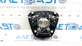 The Ford Escape MK4 20-25 driver's steering wheel airbag has scratches.