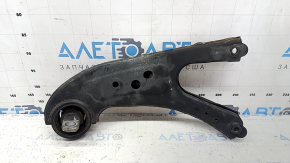 The rear right longitudinal control arm of a Toyota Sienna 21-24 has a cracked silent block.