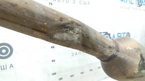 The intake pipe with the catalytic converter of the Toyota Sienna 21-24 is crushed.