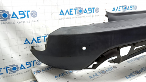 Ford Escape MK4 20-24 rear bumper with parking sensors and no towbar. Structure, scratches, and a detached parking sensor ring.