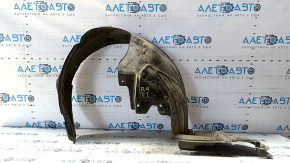 Subaru B9 Tribeca front left fender liner missing fragment