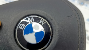 Steering wheel airbag for the driver's side of a BMW X5 G05 19-24, black leather, dents, scratches