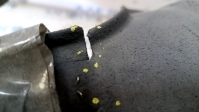 The rear right fender liner of the front part of the Mazda 6 14-17 has tears.