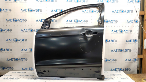 The front left door of a Ford Escape MK3 2013-2019 is bare, with dents and bumps.