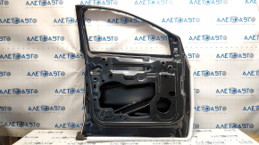 The front left door of a Ford Escape MK3 2013-2019 is bare, with dents and bumps.