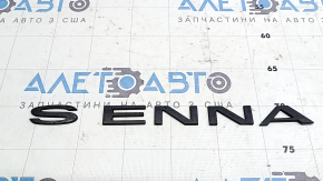 The SIENNA emblem on the trunk door of the Toyota Sienna 21-24 is missing the letter I.