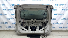 The trunk door is bare with glass from a Nissan Rogue, 14-20 tinted, graphite KAD, the wiring is cut, it is burnt out.