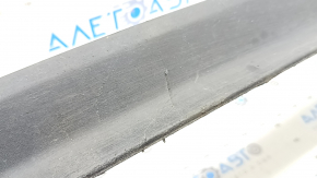 The front bumper lip of the Nissan Murano z52 15-24 is worn and scratched.