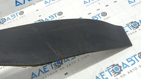 The front bumper lip of the Nissan Murano z52 15-24 is worn and scratched.