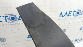 The front bumper lip of the Nissan Murano z52 15-24 is worn and scratched.