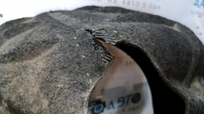 The rear left fender liner of a VW Jetta 19-24 is torn.