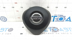 The driver's side airbag in the steering wheel of a Nissan Rogue 17-20 is black and the mount is broken.