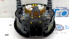 The driver's side airbag in the steering wheel of a Nissan Rogue 17-20 is black and the mount is broken.