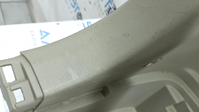 Left arch trim for Toyota Prius V 12-17 beige, scratches, needs cleaning