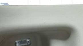 Left arch trim for Toyota Prius V 12-17 beige, scratches, needs cleaning