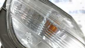 Right turn signal for a 1992 Toyota Prius V, sand, crack in the glass.