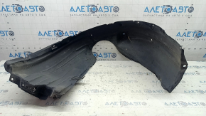 The front left fender liner of a Lexus ES300h ES350 13-18 has torn fasteners.