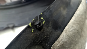 The front left fender liner of a Lexus ES300h ES350 13-18 has torn fasteners.