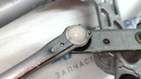 The wiper linkage with the motor of the Toyota Prius V 12-17 is cracked.