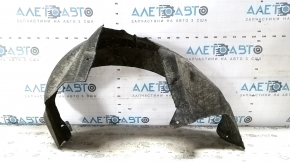 The rear left fender liner of a Ford Focus mk3 11-18 is torn and has cracks.