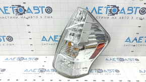 Right headlight for a pre-restored Toyota Prius V 12-14, scratches