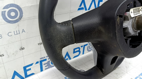 Naked steering wheel for a Nissan Rogue 17-20, black leather, no buttons, needs cleaning, scratches