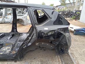 Quarter wing rear left Nissan Rogue 21-24 US built, on the body, black, bumps, dented