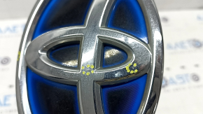 Toyota emblem badge front bumper Toyota Prius V 12-17 crack, sand