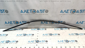 Upper front left door molding for a 16-23 Chevrolet Camaro, black, scratched