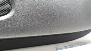 The door panel, front right, Chevrolet Equinox 18-24, is black, the armrest is gray leather, there is no window lift control, there is a scratch