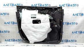 The door panel, front right, Chevrolet Equinox 18-24, is black, the armrest is gray leather, there is no window lift control, there is a scratch