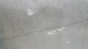 Lower tailgate trim for a 1920 Nissan Rogue, black, scratches