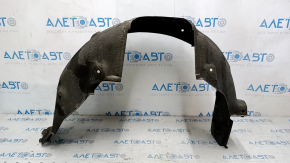 The rear right fender liner of a Lexus ES300h ES350 13-18 has torn fasteners.