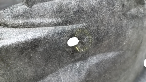 The rear right fender liner of a Lexus ES300h ES350 13-18 has torn fasteners.