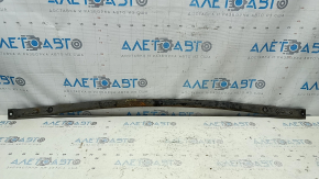 The rear beam strut of a Toyota Prius V 12-17 is dented and rusty.