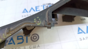 The fuse box housing under the hood of a Toyota Camry v40 has broken latches.