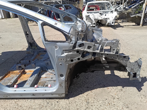 Front right quarter panel of a Toyota Prius V 12-17 on the body, blue