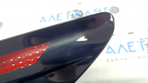 Hyundai Tucson 22-25 LED right outer fender light is worn.