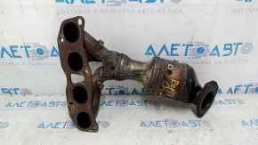 The exhaust manifold with a catalytic converter on a Nissan Rogue 14-19 has a broken bolt.