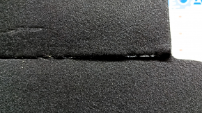 The trunk floor of a 2023-24 Honda Accord is black and torn.