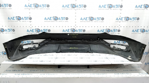 The bare lower rear bumper of a Hyundai Tucson 22-24 without parking sensors, structure, dented, cracked, scratched, broken fasteners