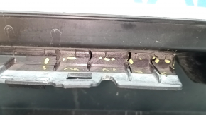 The bare lower rear bumper of a Hyundai Tucson 22-24 without parking sensors, structure, dented, cracked, scratched, broken fasteners