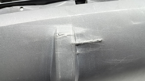 The bare lower rear bumper of a Hyundai Tucson 22-24 without parking sensors, structure, dented, cracked, scratched, broken fasteners