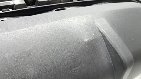 The bare lower rear bumper of a Hyundai Tucson 22-24 without parking sensors, structure, dented, cracked, scratched, broken fasteners