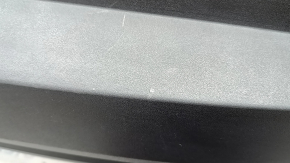 The bare lower rear bumper of a Hyundai Tucson 22-24 without parking sensors, structure, dented, cracked, scratched, broken fasteners
