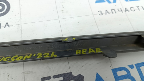 Rear bumper central molding Hyundai Tucson 22-24, gray structure, no fastening, worn