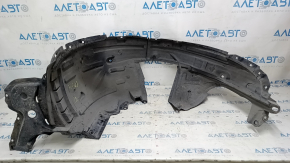 The front left fender liner of a Nissan Rogue 14-20 is broken and the sound insulation is torn.