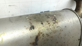 The rear muffler with the barrel of the Lexus ES300h 13-18 is dented.