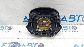 The steering wheel airbag for the driver's Hyundai Tucson 22-24 is black and melted.